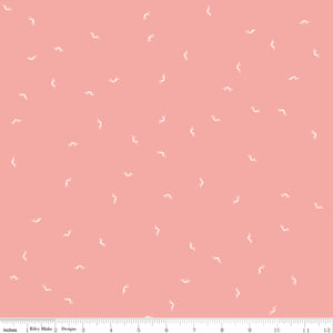 Between the Pages - Open Book in Coral by the 1/2 yard